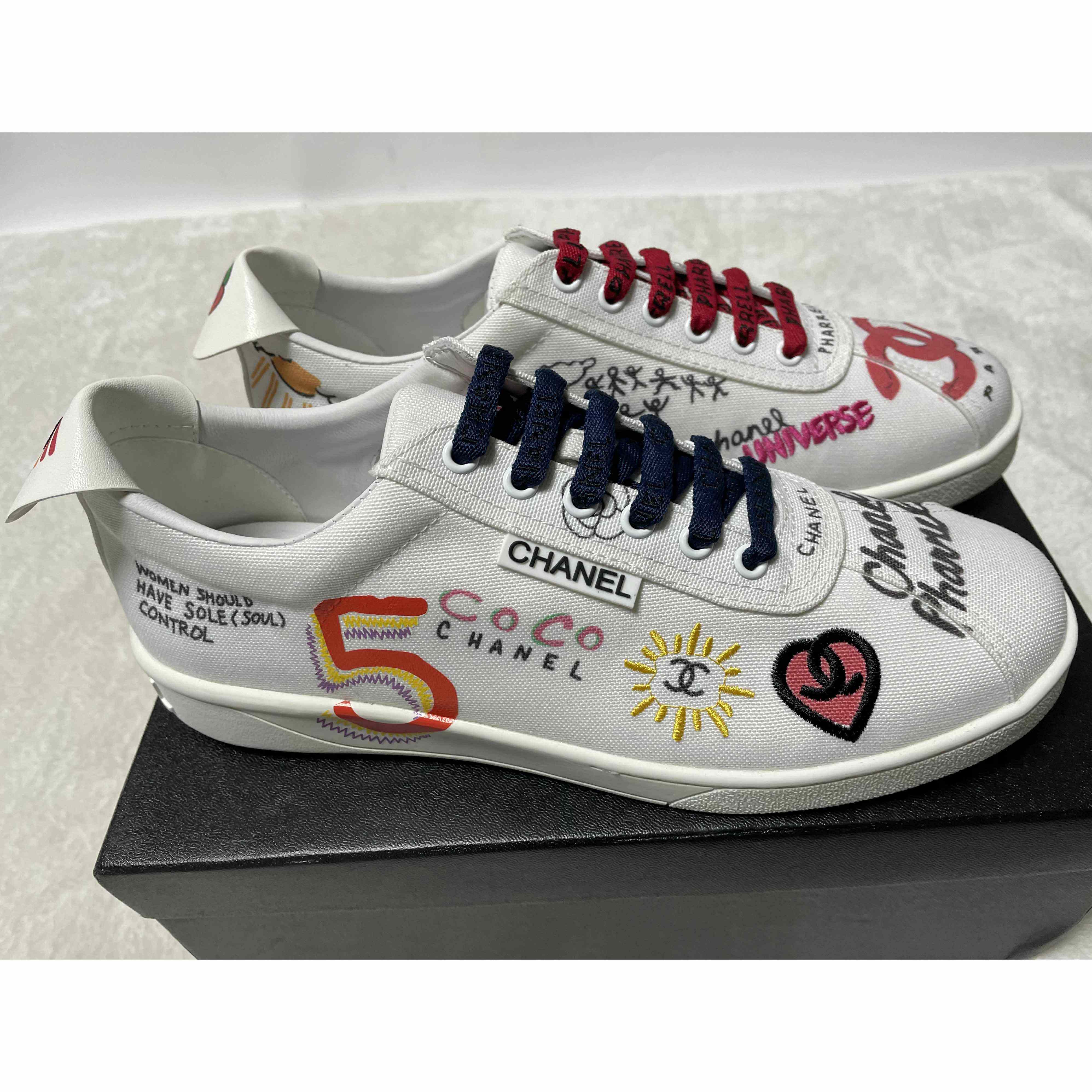 Chanel X Pharrell 19D White Graffiti CC Low Top Lace Up Flat Sneakers - everydesigner