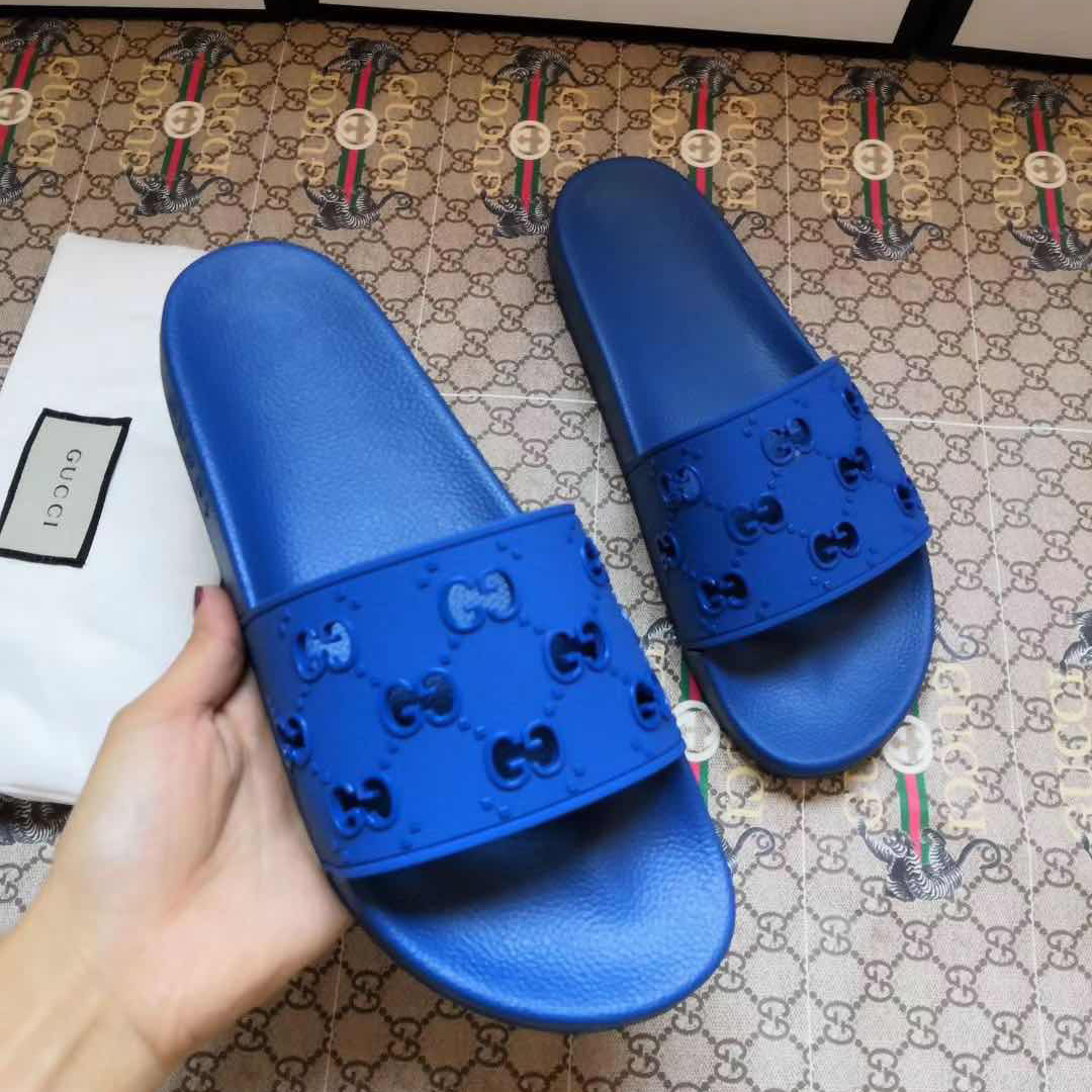 Gucci Rubber GG Slide Sandal In Blue - everydesigner