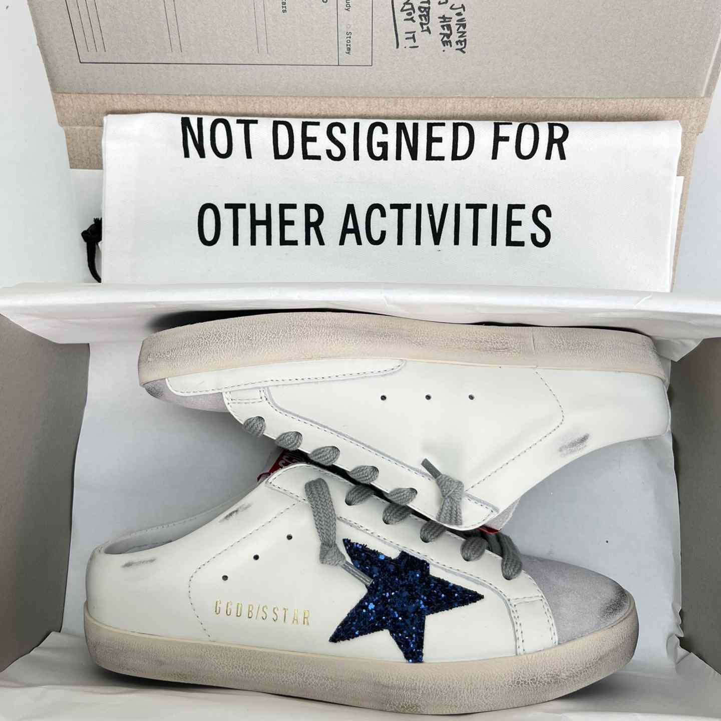 Golden Goose Super-Star Sabots In White Leather With Blue Glitter Star And Dove-Gray Suede Tongue - everydesigner