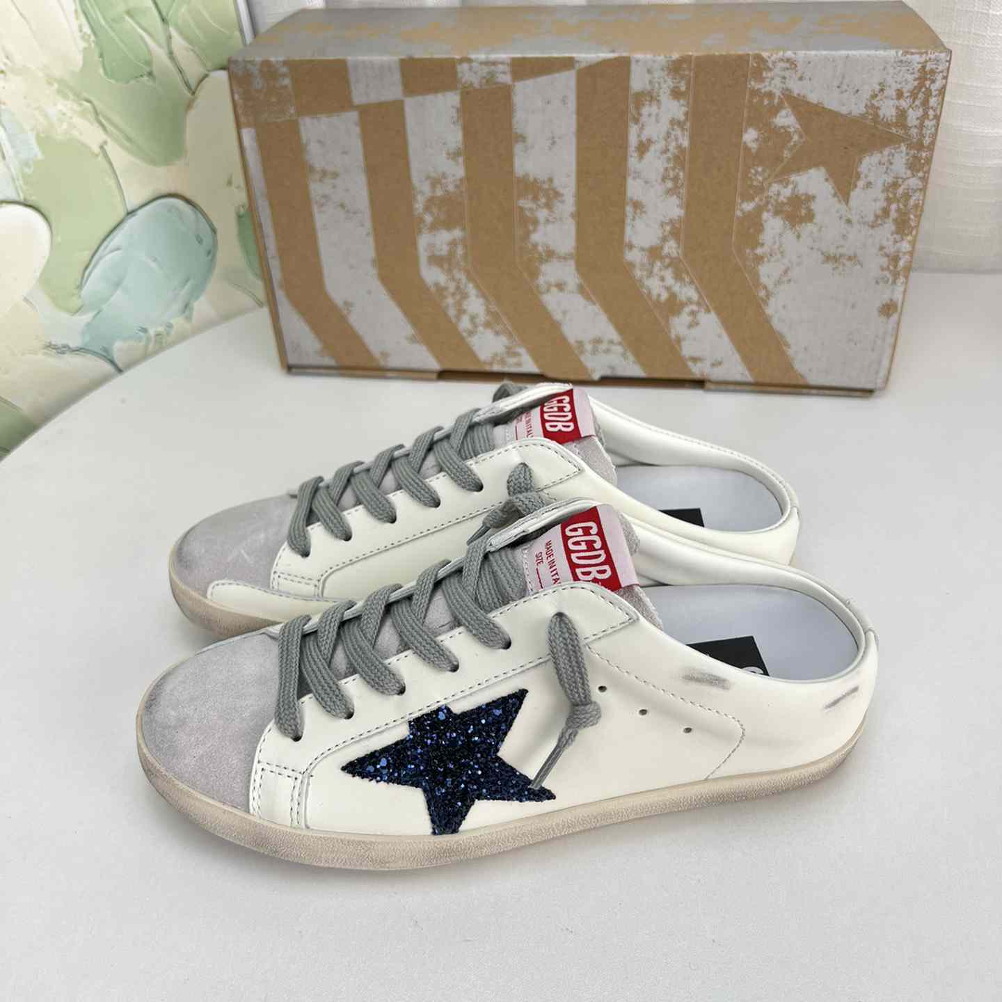 Golden Goose Super-Star Sabots In White Leather With Blue Glitter Star And Dove-Gray Suede Tongue - everydesigner