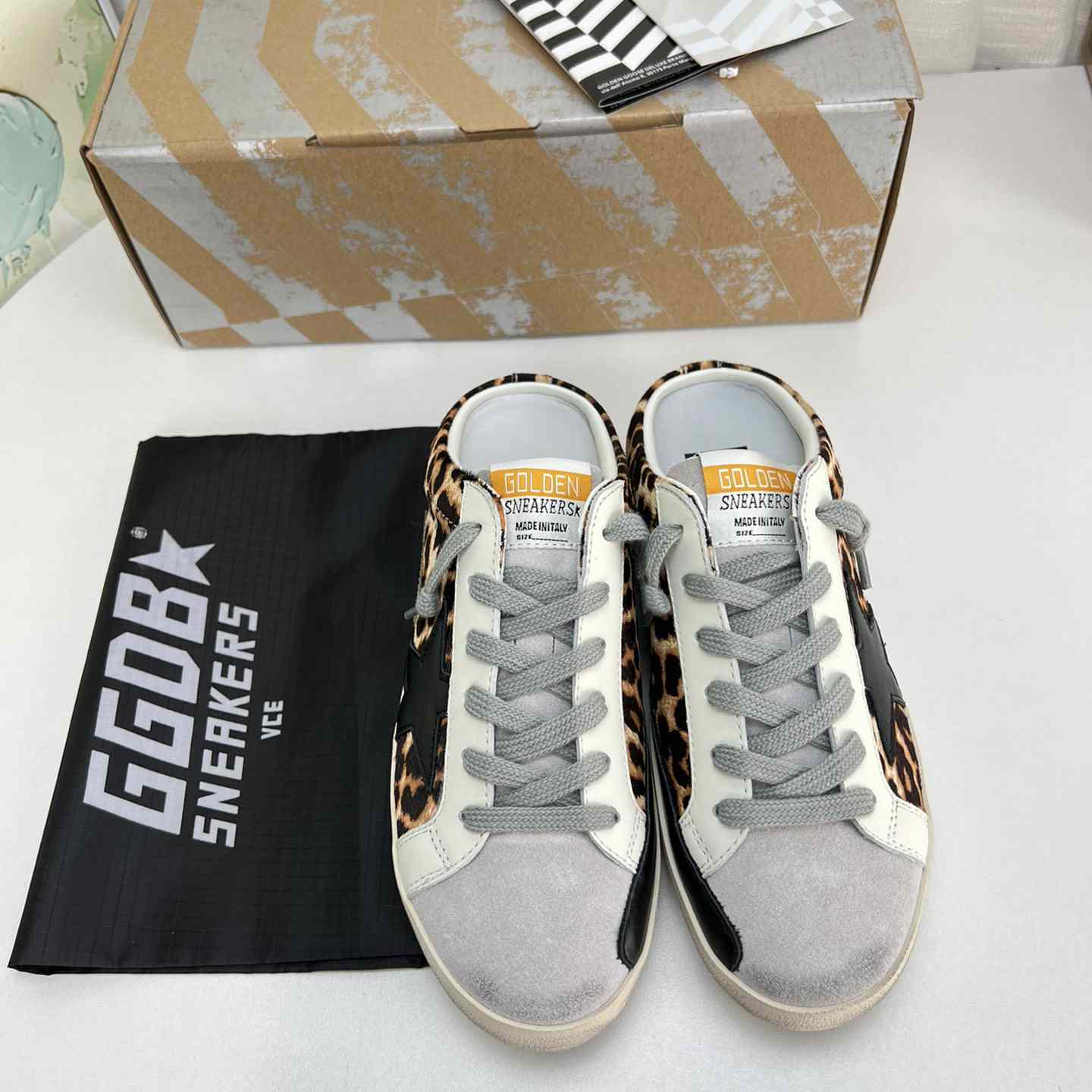 Golden Goose Super-Star Sabots In Leopard-Print Pony Skin With Black Leather Star And Ice-Gray Suede Tongue - everydesigner