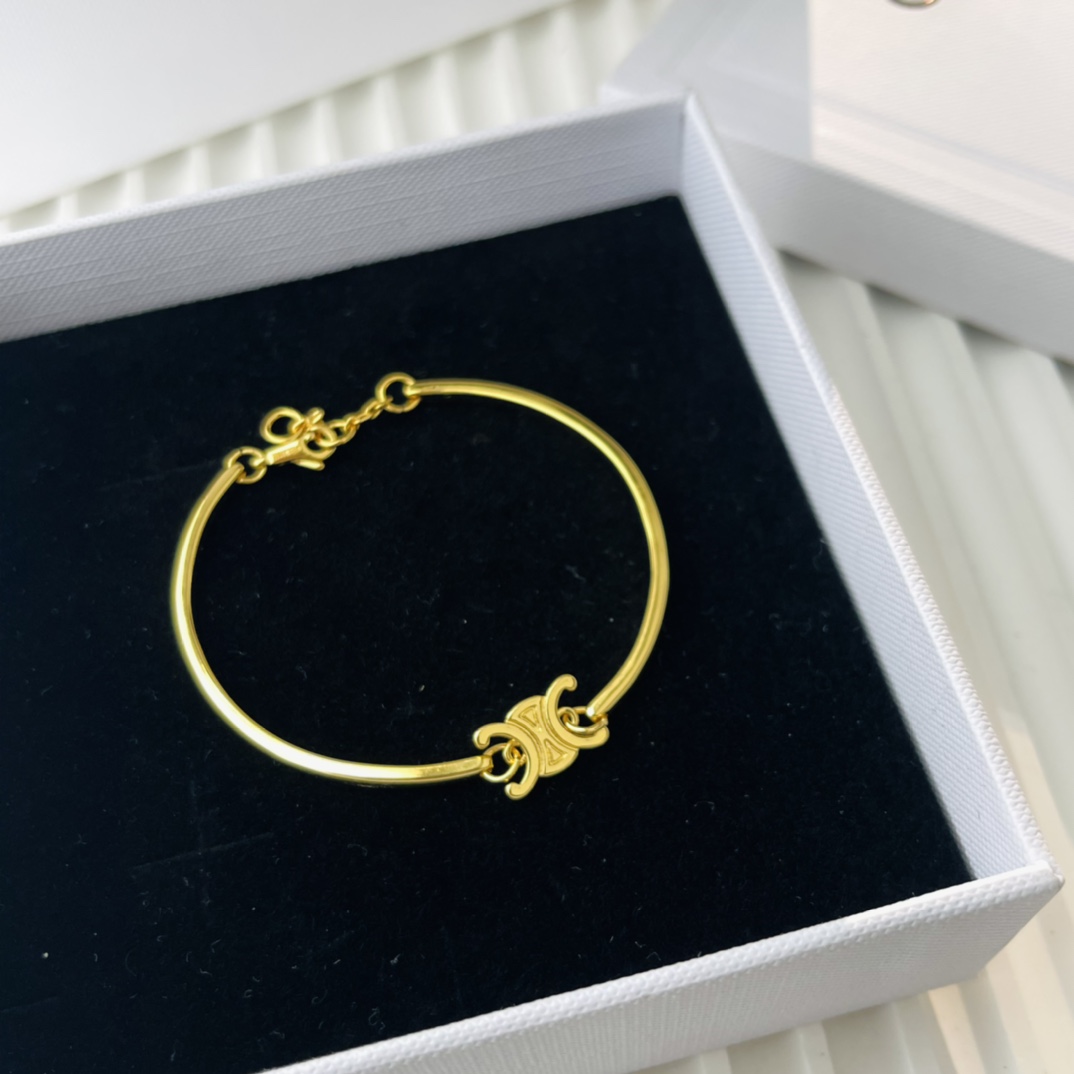 Celine Triomphe Articulated Bracelet In Brass With Gold Finish - everydesigner