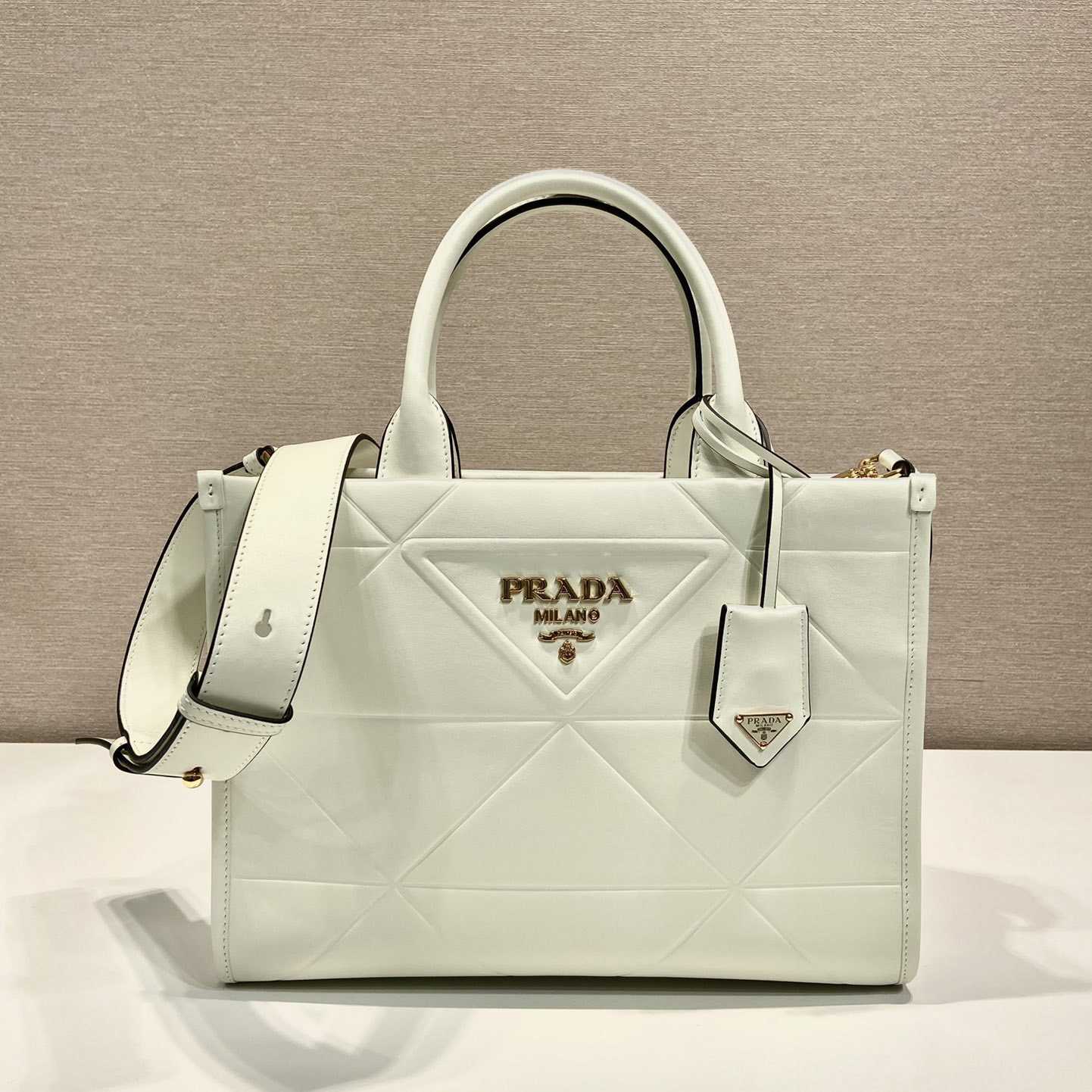 Prada Small Leather Prada Symbole Bag With Topstitching - everydesigner