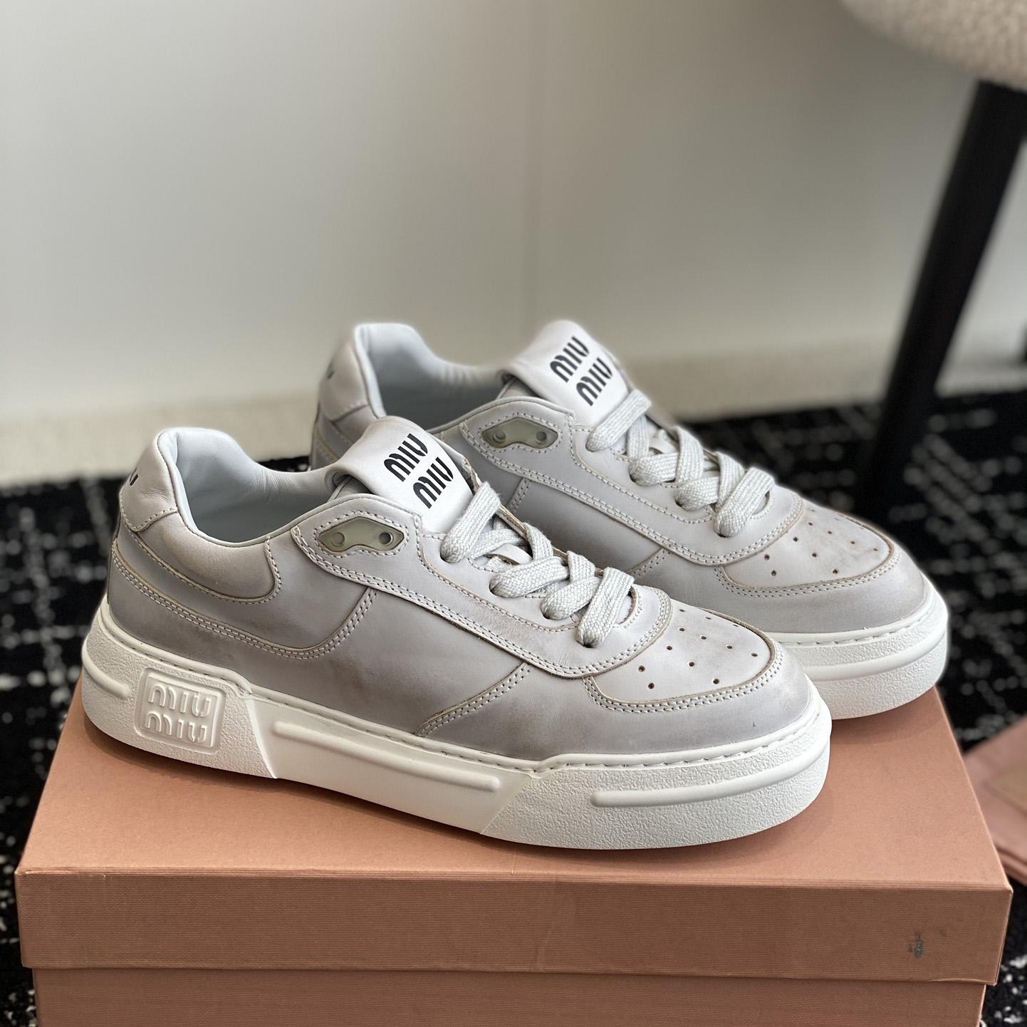 Miu Miu Bleached Leather Sneakers - everydesigner