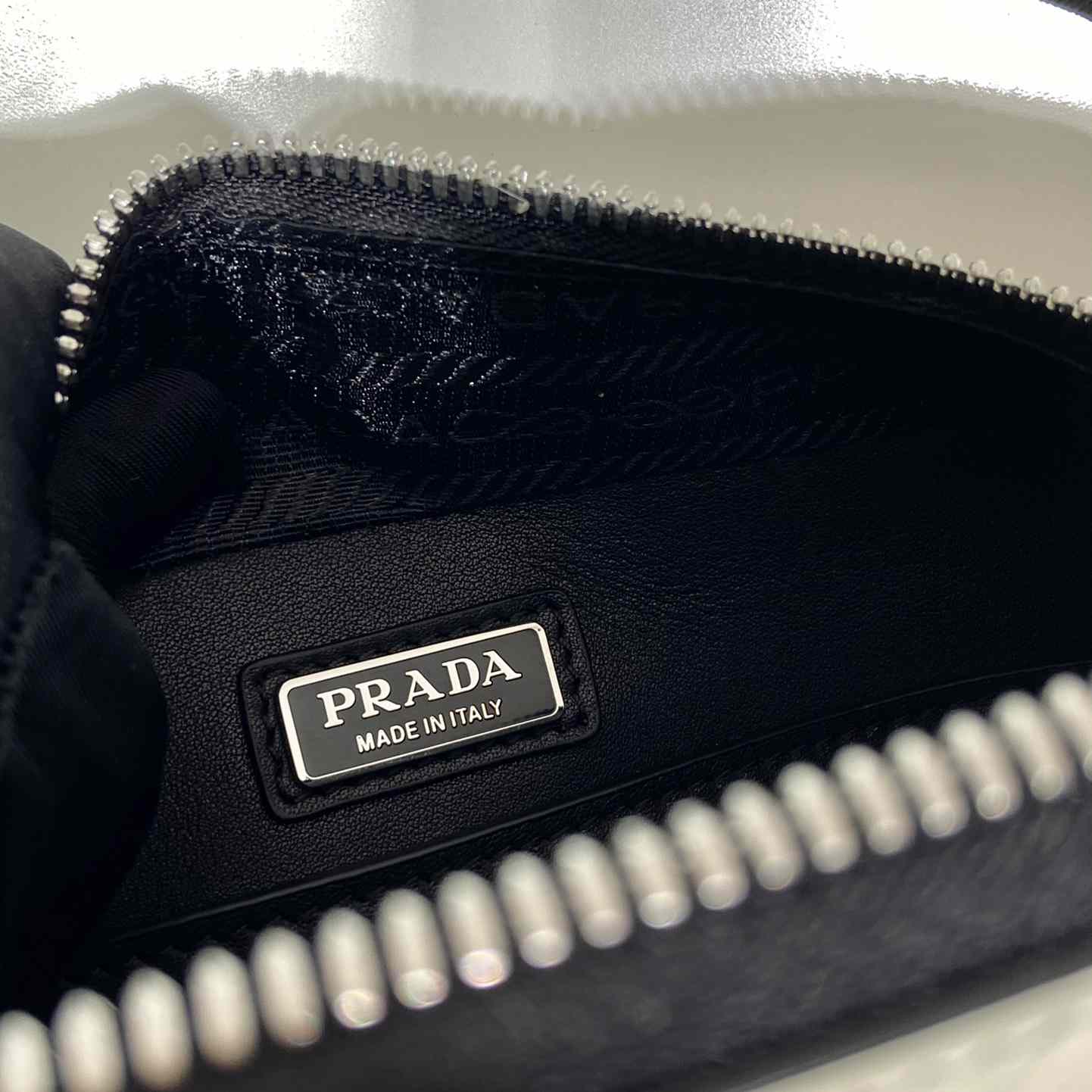 Prada Brique Brushed Leather Bag With Triangle Motif - everydesigner