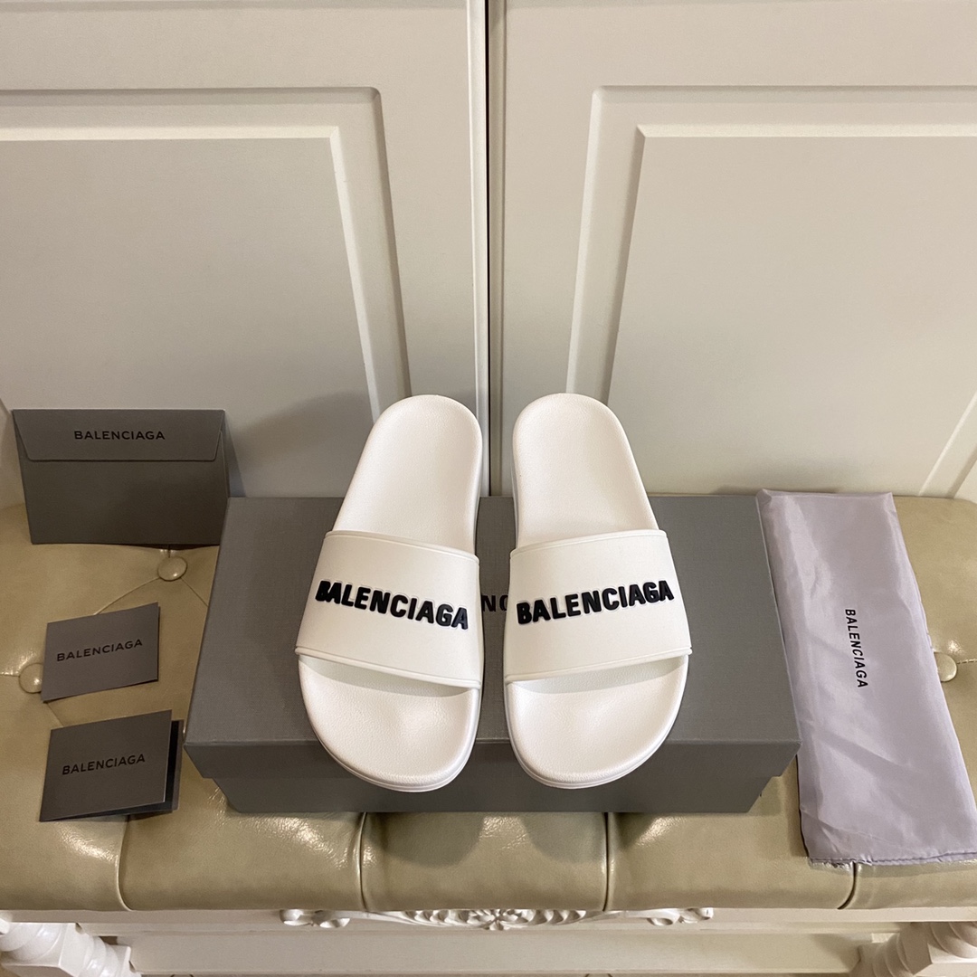 Balenciaga Pool Slide Sandal In White Smooth Rubber With Black 3D Balenciaga Logo - everydesigner