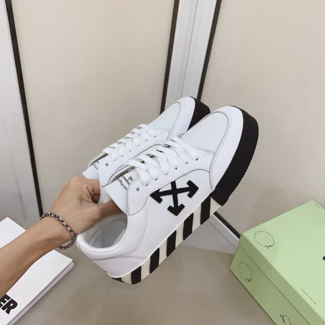 Off White Canvas Vulcanized Low Sneakers - everydesigner