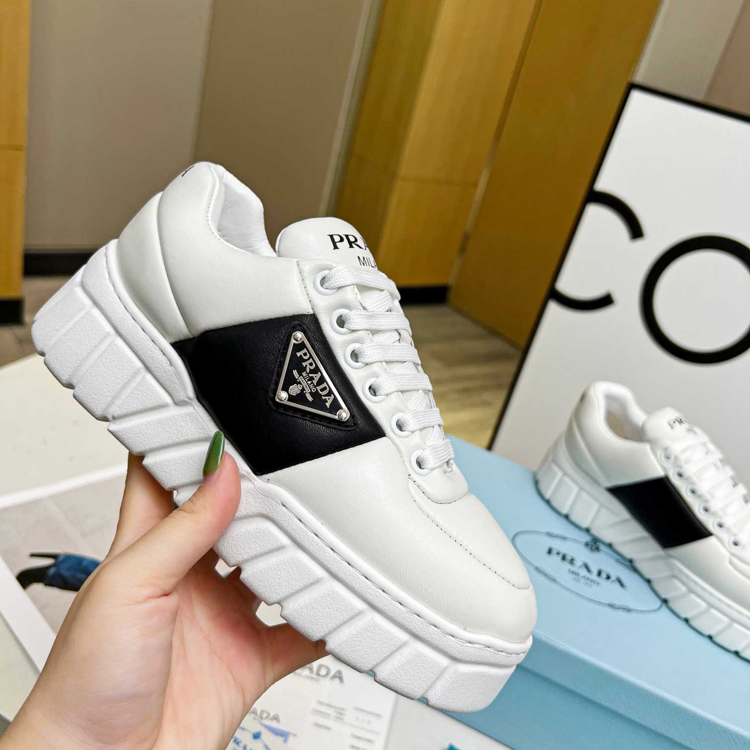 Prada Padded Nappa Leather Sneakers - everydesigner