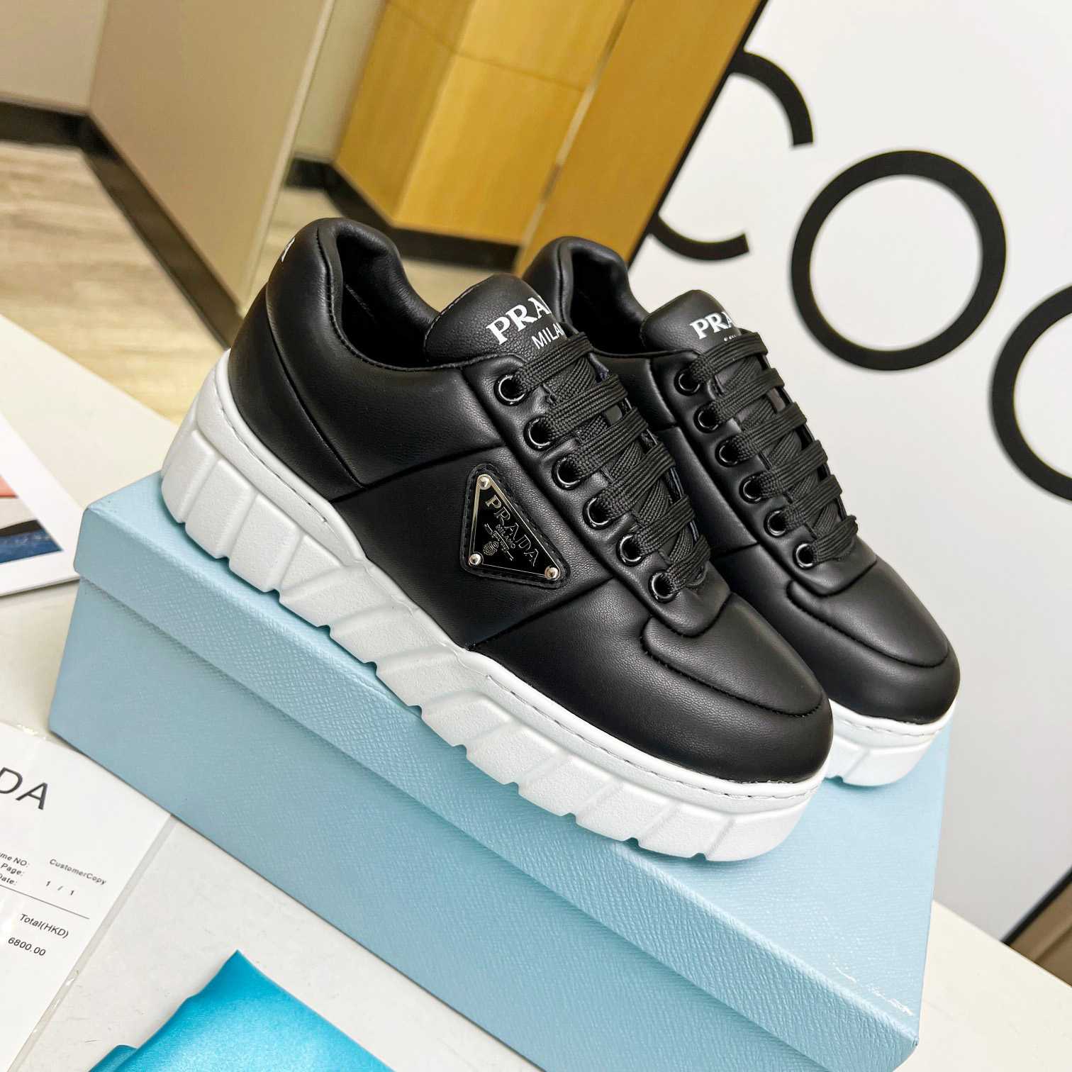 Prada Padded Nappa Leather Sneakers - everydesigner