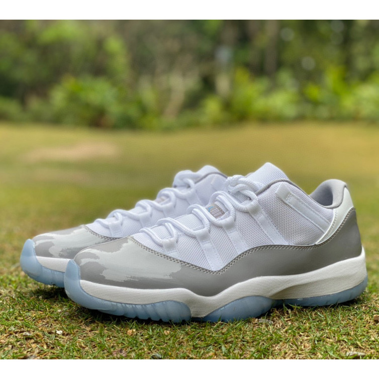 Air Jordan 11 Retro Low "Cement Grev" Sneaker     av2187-140 - everydesigner