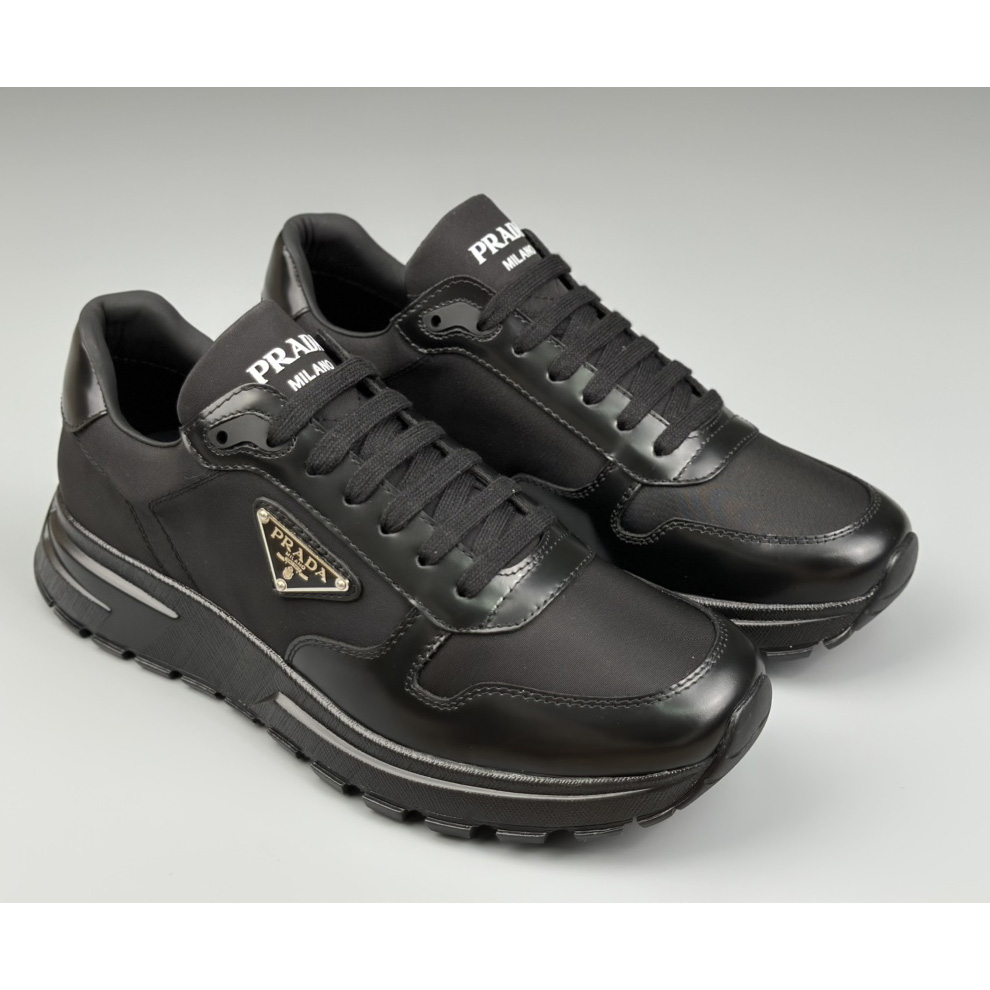 Prada Re-Nylon And Brushed Leather Sneakers - everydesigner