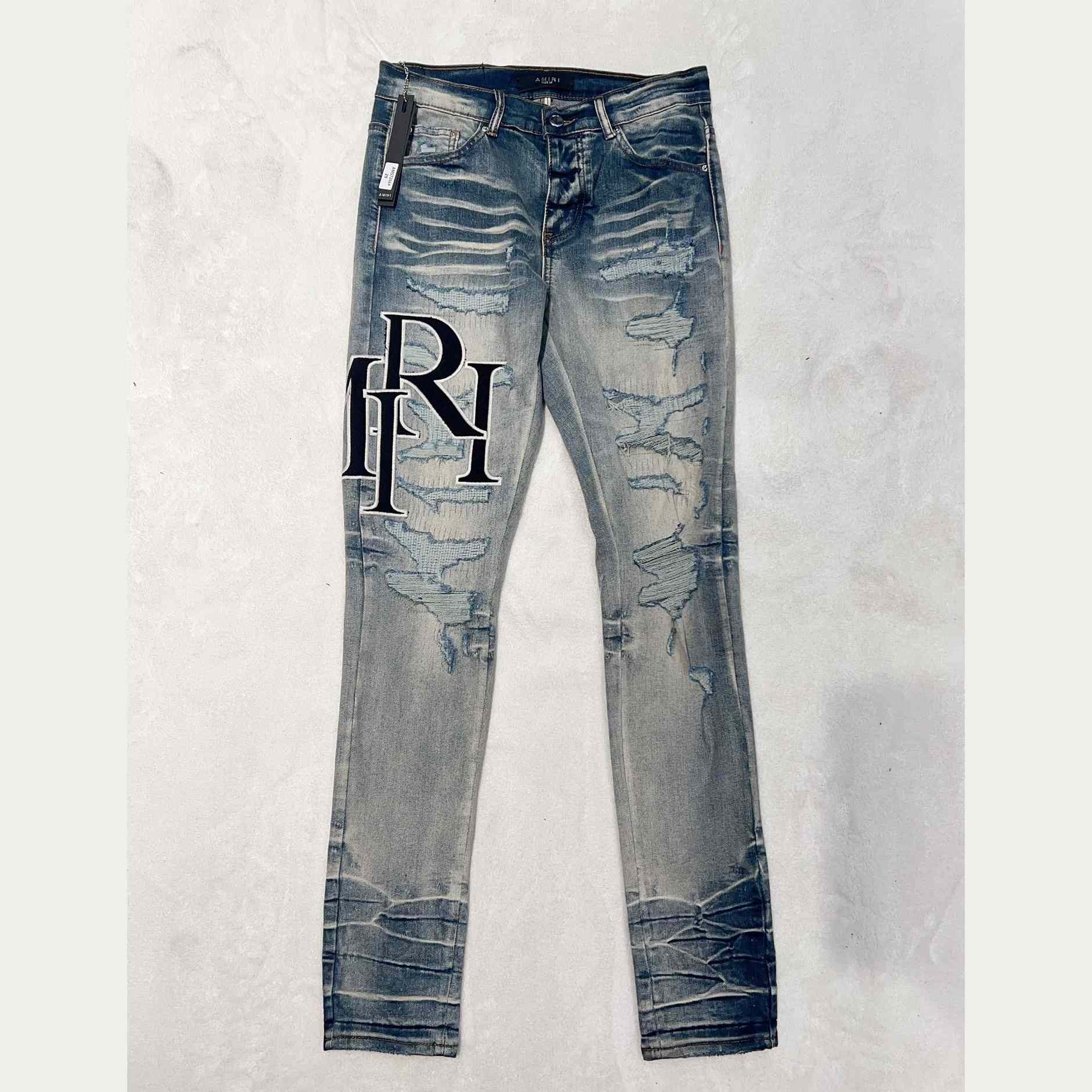 Amiri Staggered Jeans  AM7266 - everydesigner