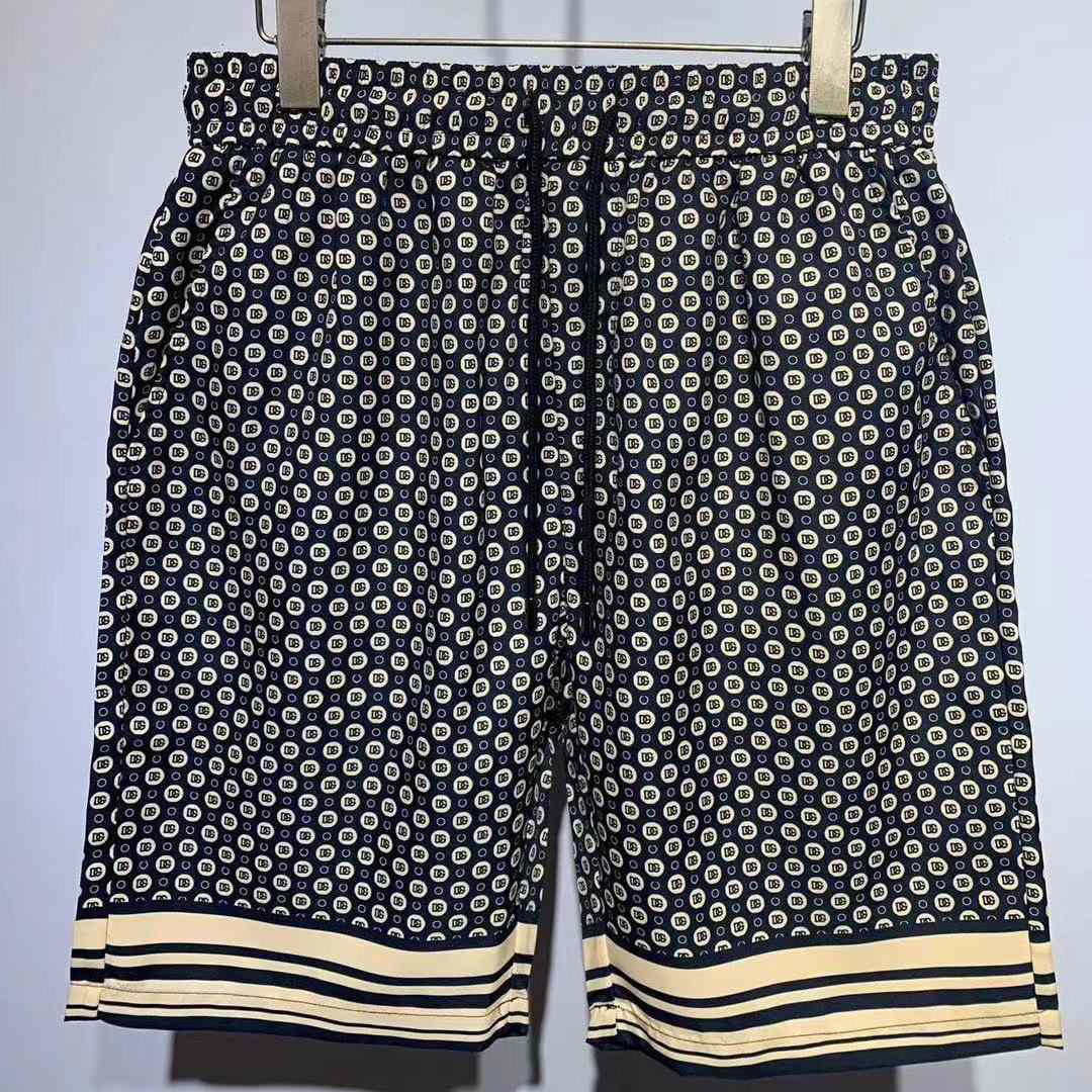 Dolce & Gabbana Silk Twill Jogging Shorts With DG Logo Print - everydesigner