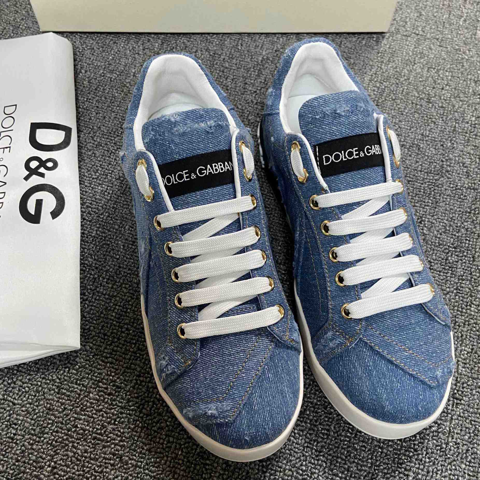 Dolce & Gabbana Portofino Denim Patchwork Trainers In Blue - everydesigner